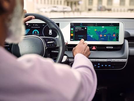 An electric car’s cockpit display shows the battery's state of charge